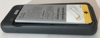Phone shows that a swollen battery doesn't lie flat in the battery compartment.