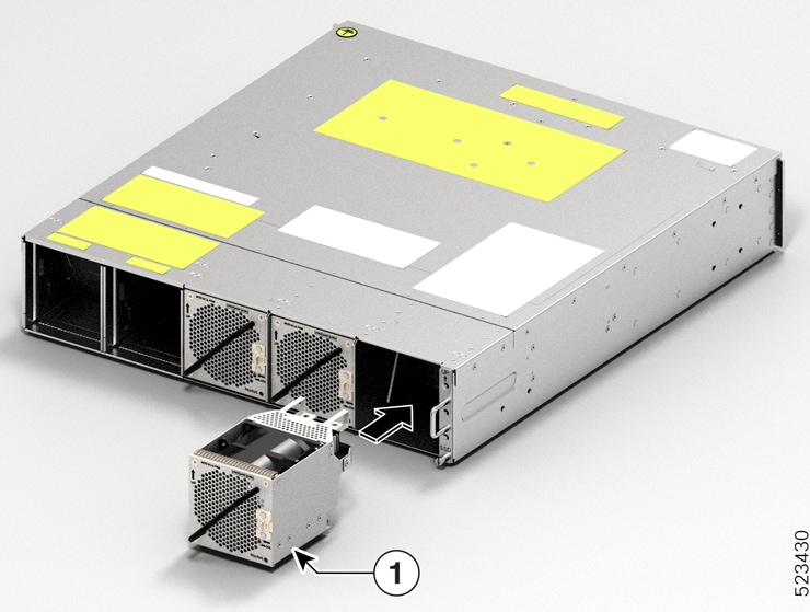 This image shows the installation of a Fan Tray into the Cisco NCS 1014 chassis.