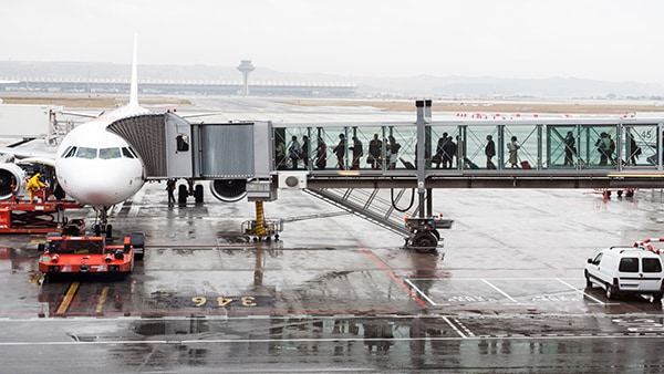 Passengers boarding an airplane
