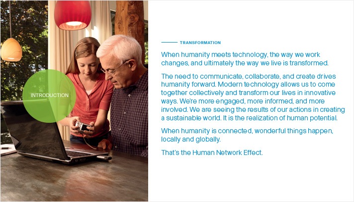 The Human Network Effect Cisco Systems, Inc. 2008 Annual Report Photo of a granddaughter showing her grandfather how to download photos from a digital camera onto a laptop computer in a home dining room.