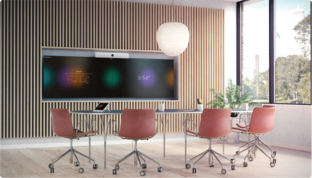 Webex Room Kit with a dual screen setup in a mid-sized meeting room