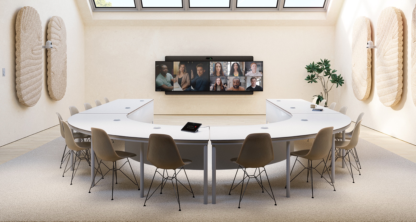 The Cisco Room Kit EQX wall-mount model deployed with carbon black Table Microphone Pro units in a conference room