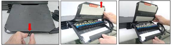 A hand holding a black box with a black coverDescription automatically generated with medium confidence