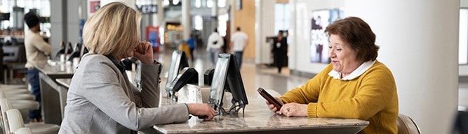 A few women sitting at a tableDescription automatically generated with low confidence