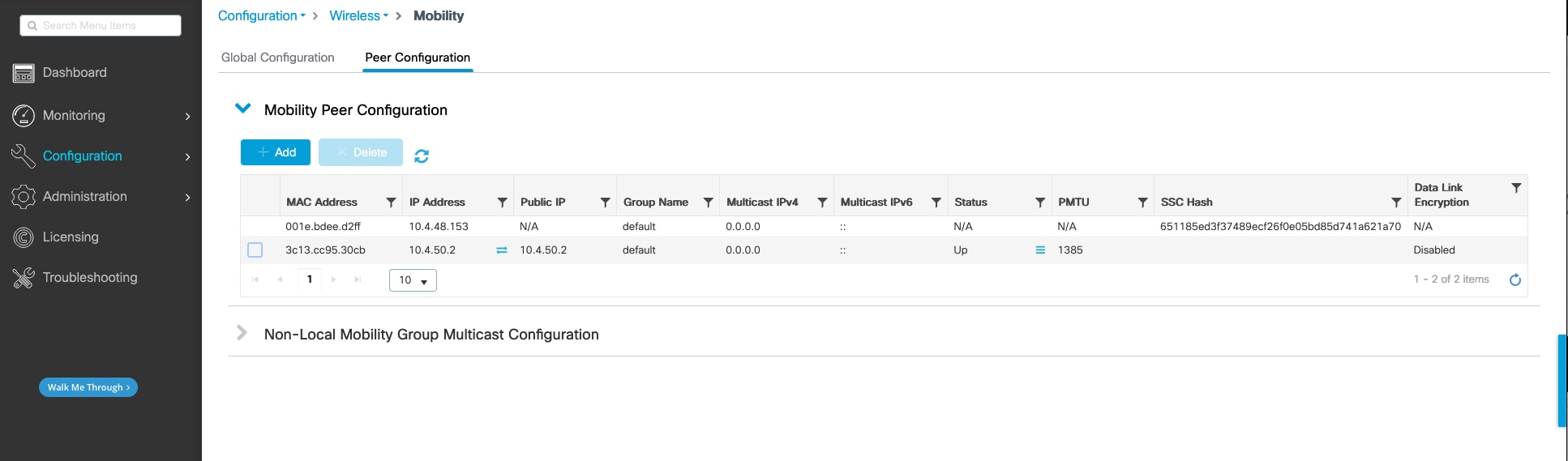 The mobility peer configuration table for the anchor controller displays a MAC address, IP address, public IP, group name, multicast IPv4, multicast IPv6, status, PMTU, SSC hash, and data link encryption.