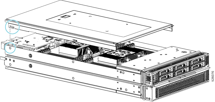 Illustration showing node top cover hovering over the node with circles showing the alignment of the notches in the node top cover with the stopper pins on the inside of the node's sheet metal wall.