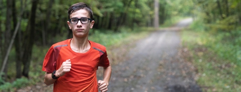 Donation recipient running through a forest