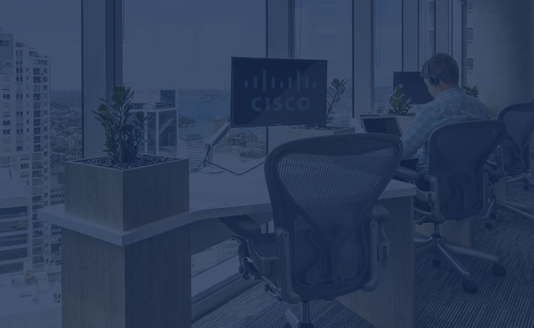 Sydney office with Cisco logo displayed on a computer scene with buildings and the ocean in the background.