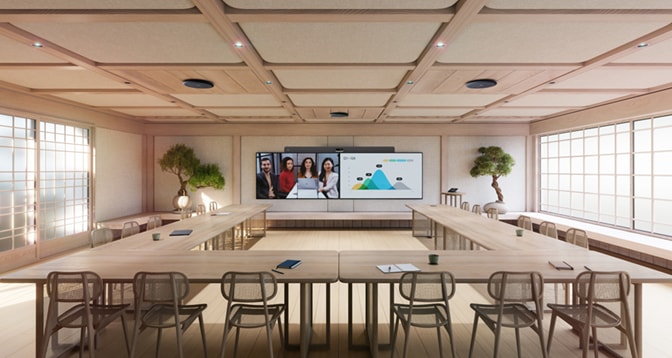 The Room Kit EQX wall-mount model deployed in a multi-purpose training space with 85-inch, dual external screens and Ceiling Microphone Pro units to provide adaptive beamforming