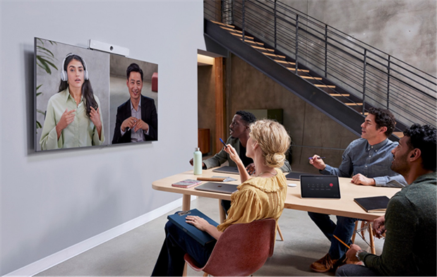 Cisco Room Bar running on the native Cisco RoomOS experience in an open huddle space