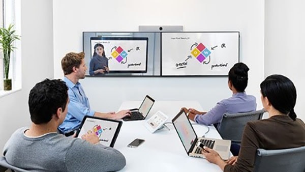 Colleagues collaborating on Cisco Webex