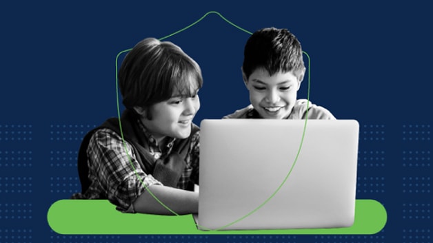 Two children looking at a laptop computer