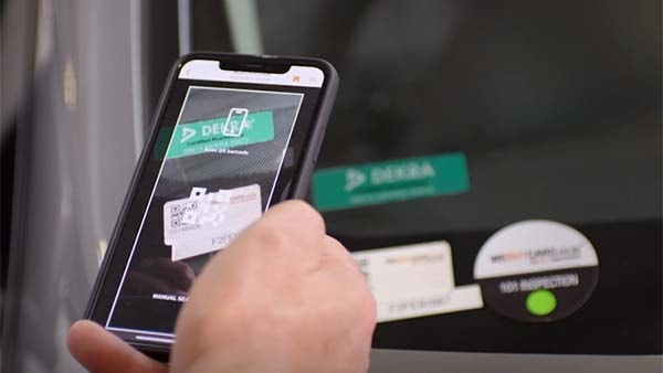 Car buyer checks a phone app