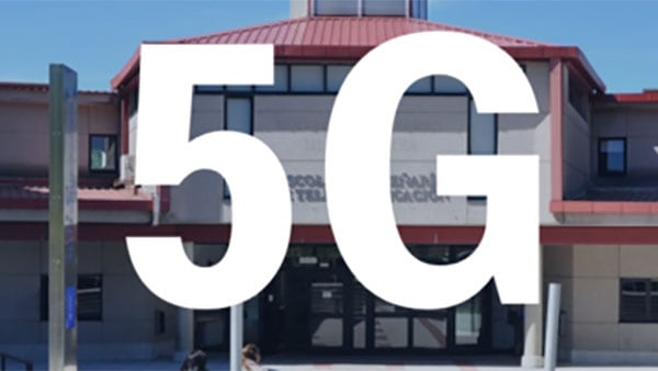 Characters 5G super imposed over a University building