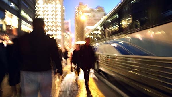 People on a metro station during night 