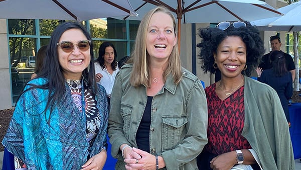Dev Stahlkopf (center) joins Cisco Legal colleagues at Pro Bono Fair in San Jose.