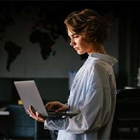 Women holding a computer