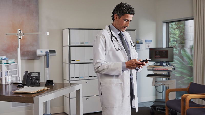 Healthcare worker on their tablet