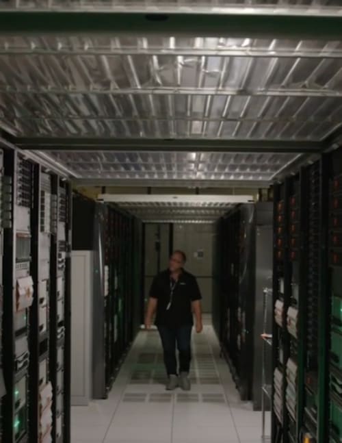 Person walking through a data center