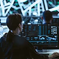 Women sitting on a computer screen