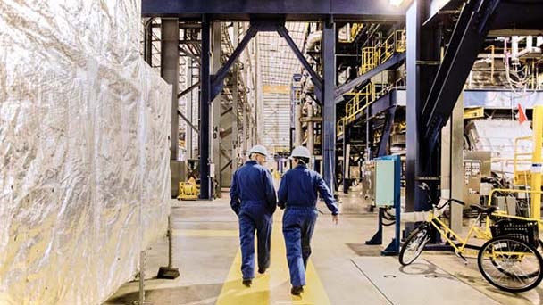 Men at work in factory