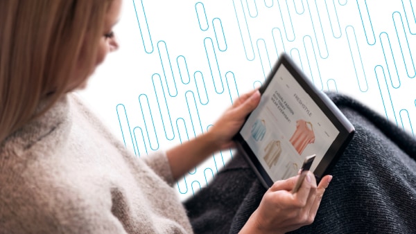 Woman using a table to shop online 