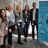 Talent Bridge team at a conference supporting partners