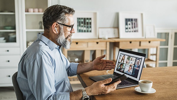 office worker attending virtual team meeting