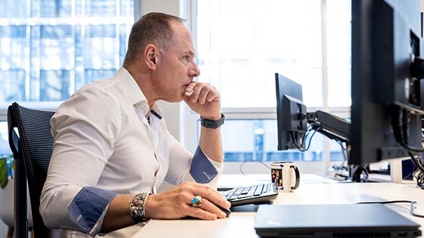 Man at desk on computer