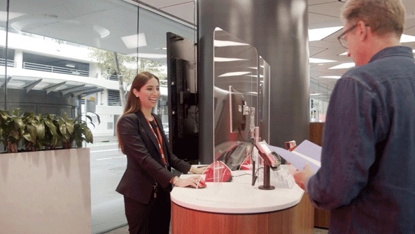 Westpac Bank employee at desk 