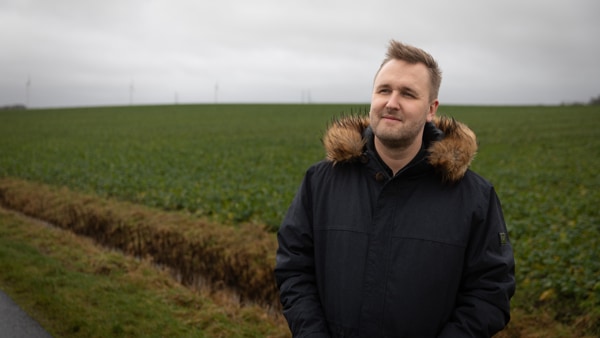 Person standing outside in a field