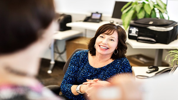 Woman smiling in the office