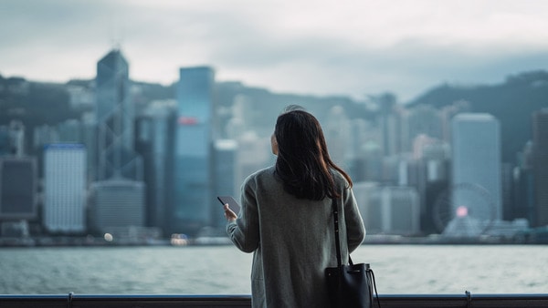 Woman looking at city view