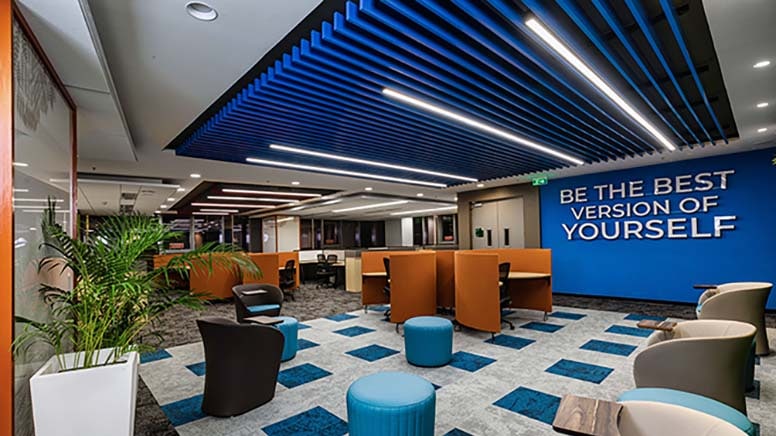 Newgen's office space showing the slogan: "Be the best version of yourself."