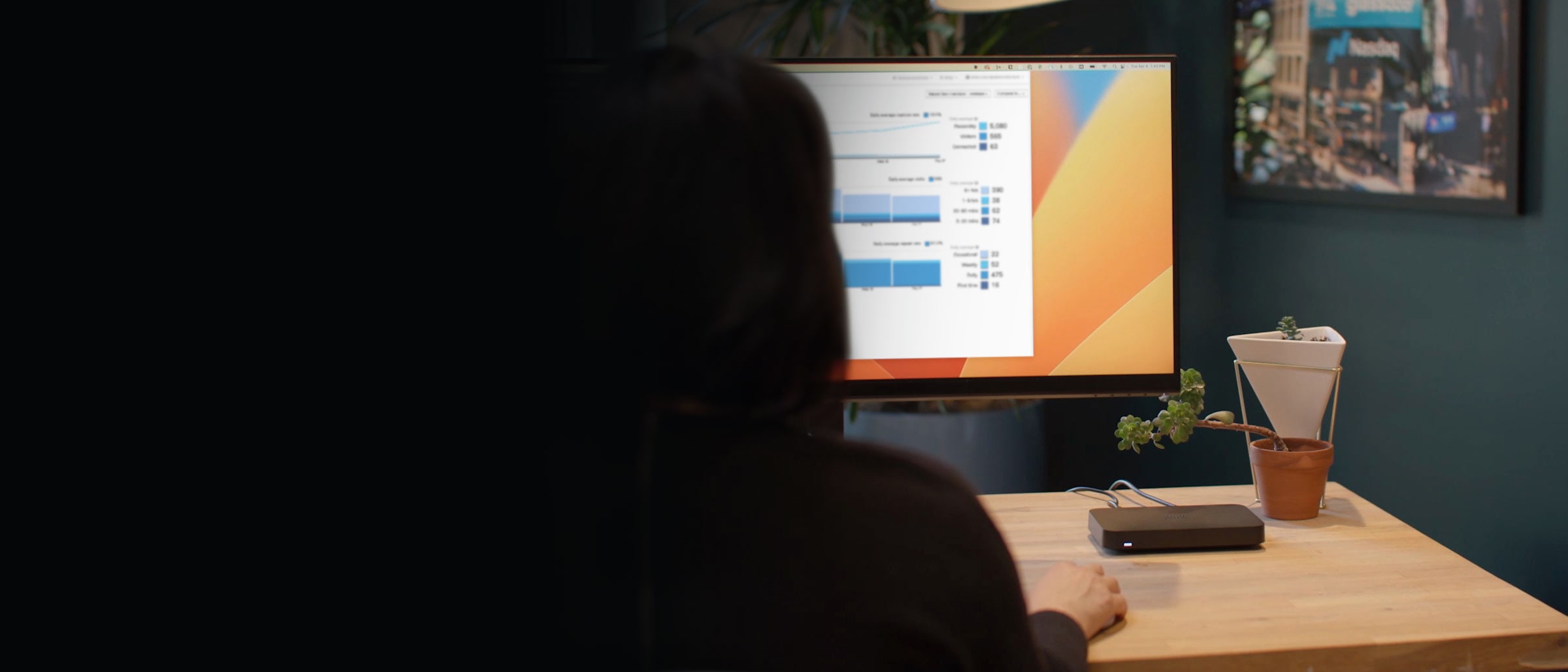 Meraki gateway router on a table connecting presentation on a projection screen