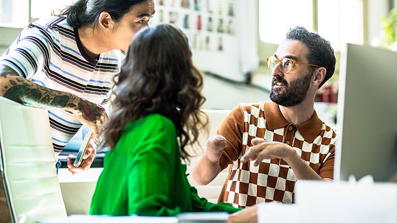 Employees fostering inclusion and collaboration