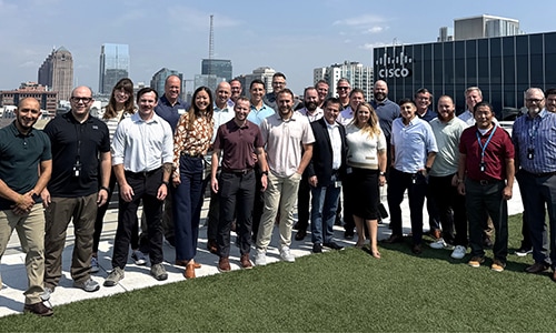 Image of two people talking at a table