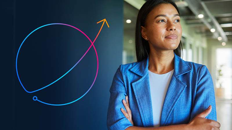 Young professional with arms crossed looking to the left