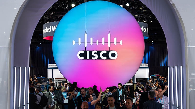 Cisco booth at technology conference with large display