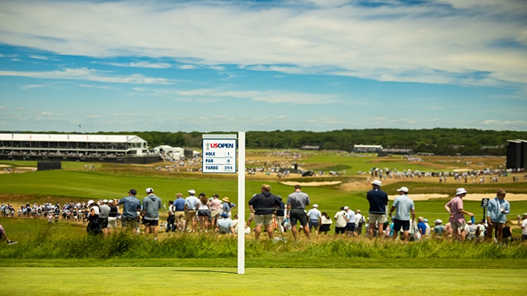 Spectators watching the U.S. Open golf tournament
