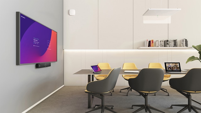 Cisco collaboration room with wireless access points, microphone, and video conferencing tools